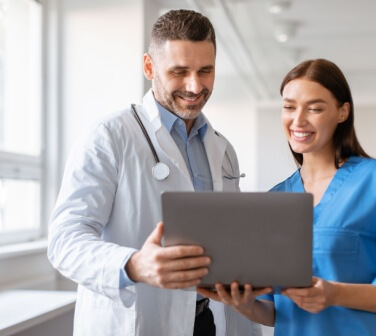 Doctor and nurse booking an appointment